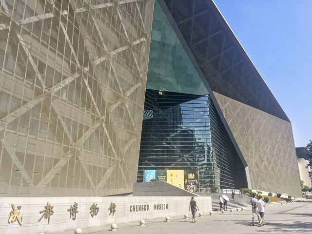 The angular dark-clad facade of Chengdu Museum above its glass entrance